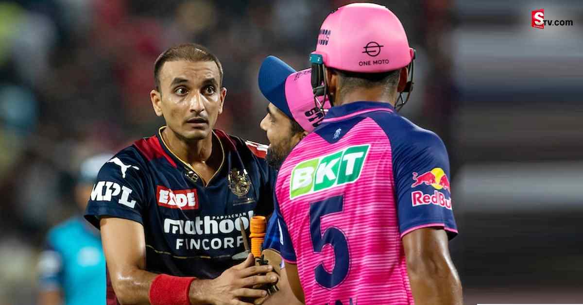 తన ఓవర్‌లో రెండు సిక్సులు కొట్టిన పరాగ్‌తో గొడవకు దిగిన హర్షల్‌ పటేల్‌