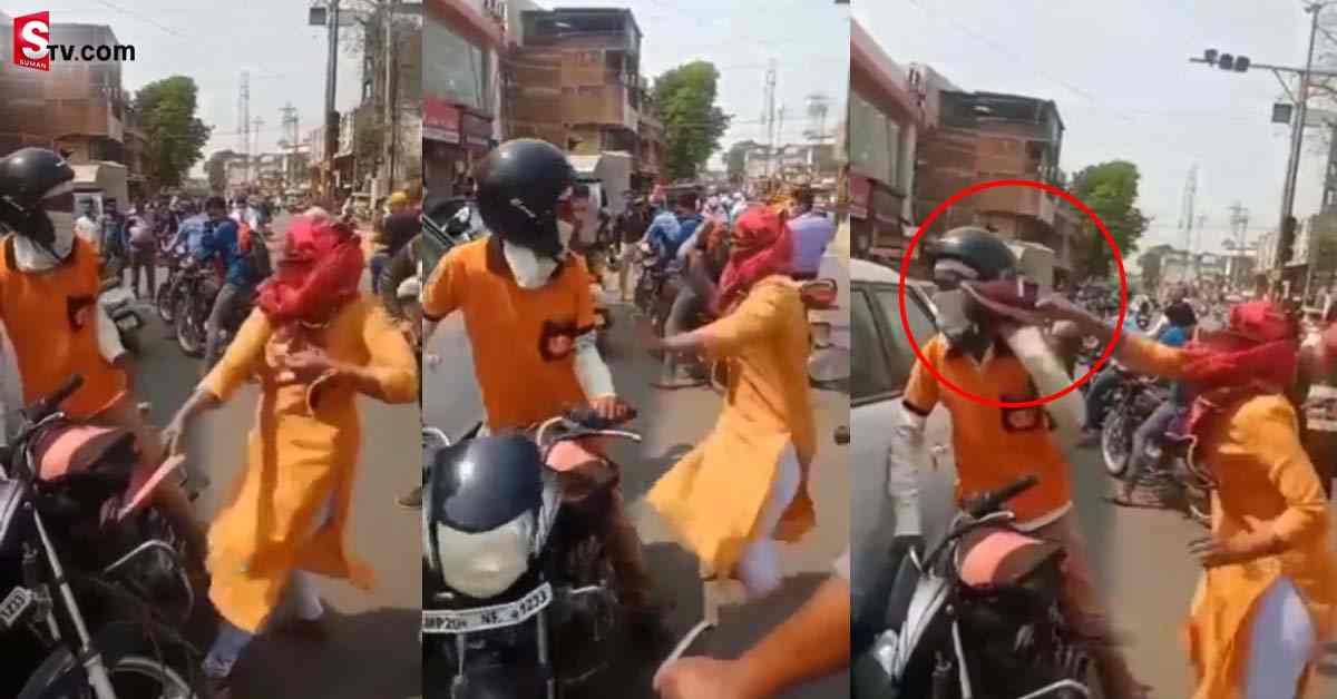 యువకుడ్ని నడి రోడ్డుపై బూటుతో చితకొట్టిన యువతి.. ఎందుకంటే?..
