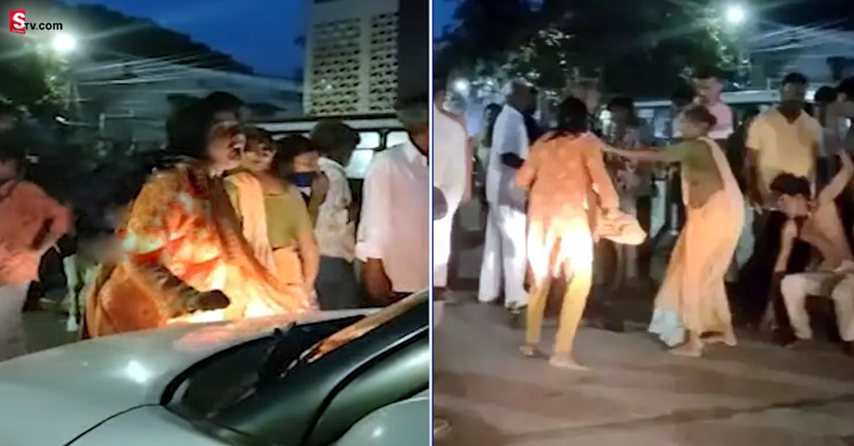వీడియో: మద్యం తాగద్దన్నందుకు నడి రోడ్డు మీద తండ్రిపై యువతి దాడి.. ఆపై బూతులతో..
