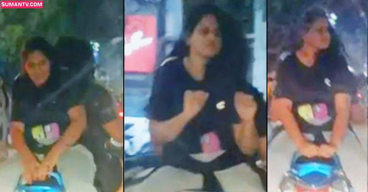 మద్యం మత్తులో యువతి వీరంగం.. నడి రోడ్డుపై!