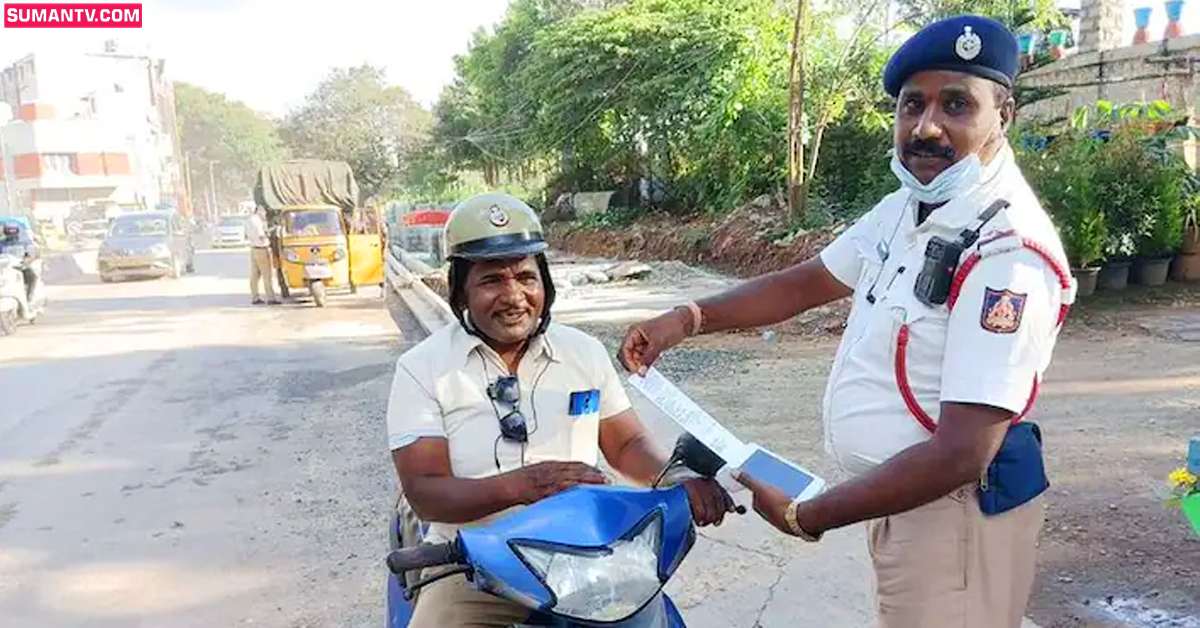 పోలీసుకు మరో పోలీసు ఫైన్.. సోషల్ మీడియాలో ఫొటో వైరల్