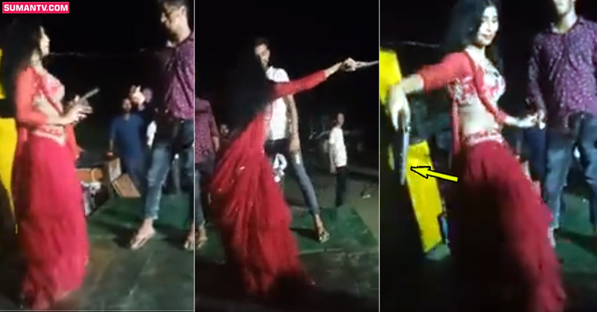Viral Video: వైరల్‌ వీడియో: చేతిలో తుపాకితో యువతి స్టేజ్‌ డ్యాన్స్‌..