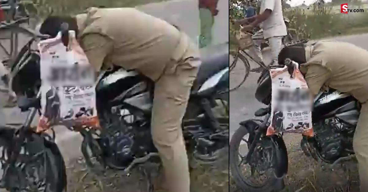 పీకల దాక తాగి బైక్ పై పడుకున్న కానిస్టేబుల్.. వైరల్ గా మారిన వీడియో!