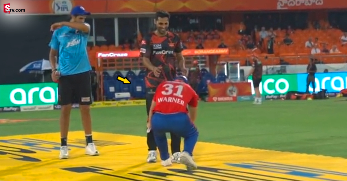 Bhuvneshwar Kumar: వీడియో: భువనేశ్వర్ కాళ్లపై పడిన వార్నర్.. షాక్​కు గురైన స్టార్ పేసర్!