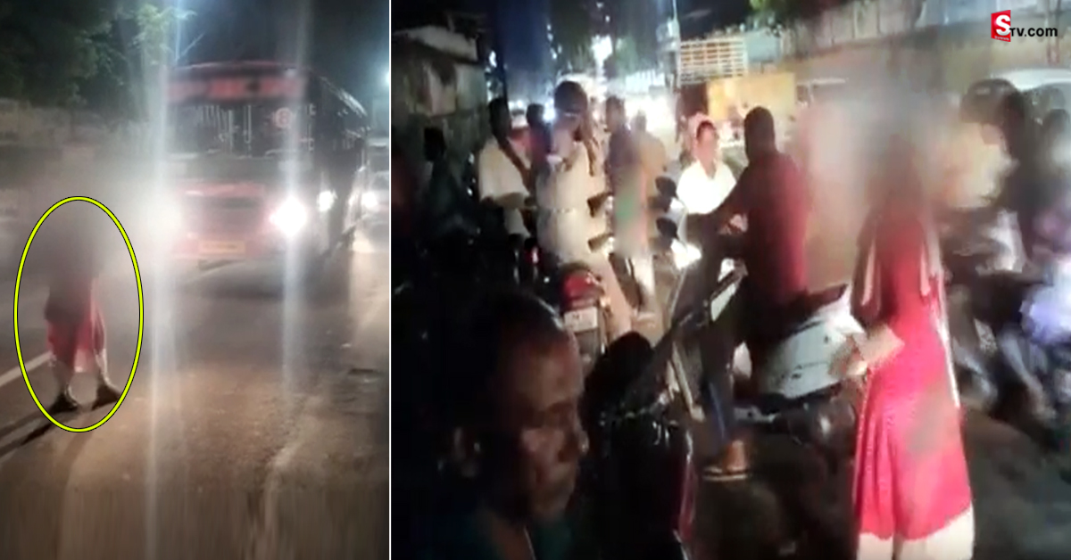 నడి రోడ్డుపై రెచ్చిపోయిన మహిళ.. రోడ్డుపై వెళుతున్న వారిని..