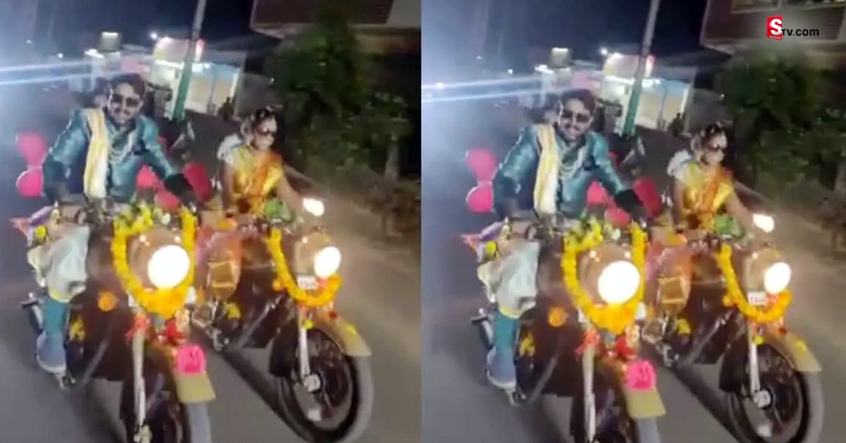 చెరో బుల్లెట్ బండెక్కి రిసెప్షన్‌కి వెళ్లిన నూతన దంపతులు.. వీడియో వైరల్