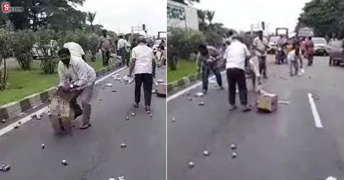 కార్లు, బైకులు ఆపి మరీ బిస్కెట్ ప్యాకెట్ల కోసం ఎగబడ్డ జనాలు