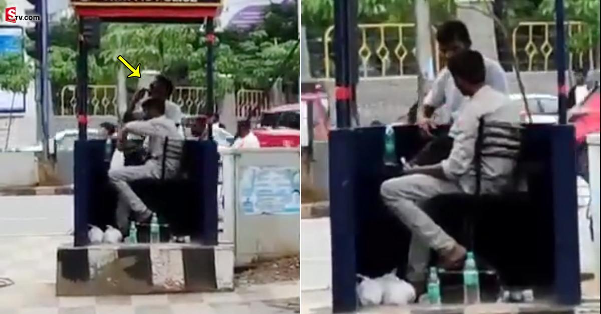 హై టెక్ సిటీ ముందు..  ట్రాఫిక్ బూత్‌లో మద్యం తాగుతూ!