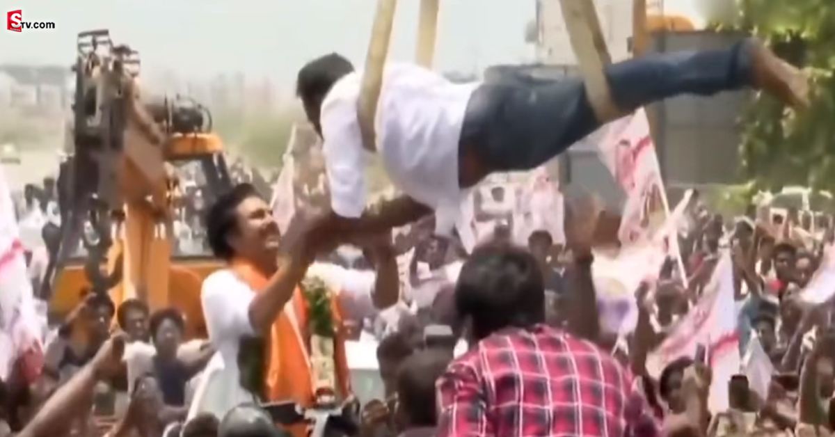 పవన్ కోసం క్రేన్ మీద వచ్చి.. శాలువా కప్పిన అభిమాని
