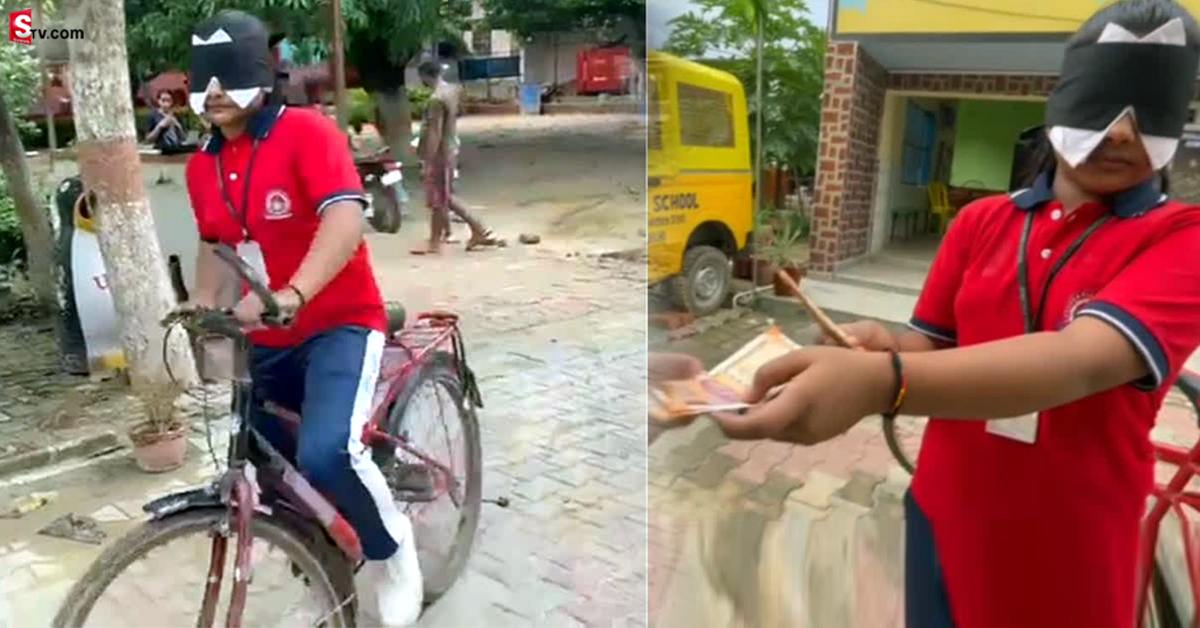 కళ్లకు గంతలతో సైకిల్ రైడ్ చేస్తున్న బాలిక.. కరెన్సీ నోట్లను గుర్తిస్తూ..